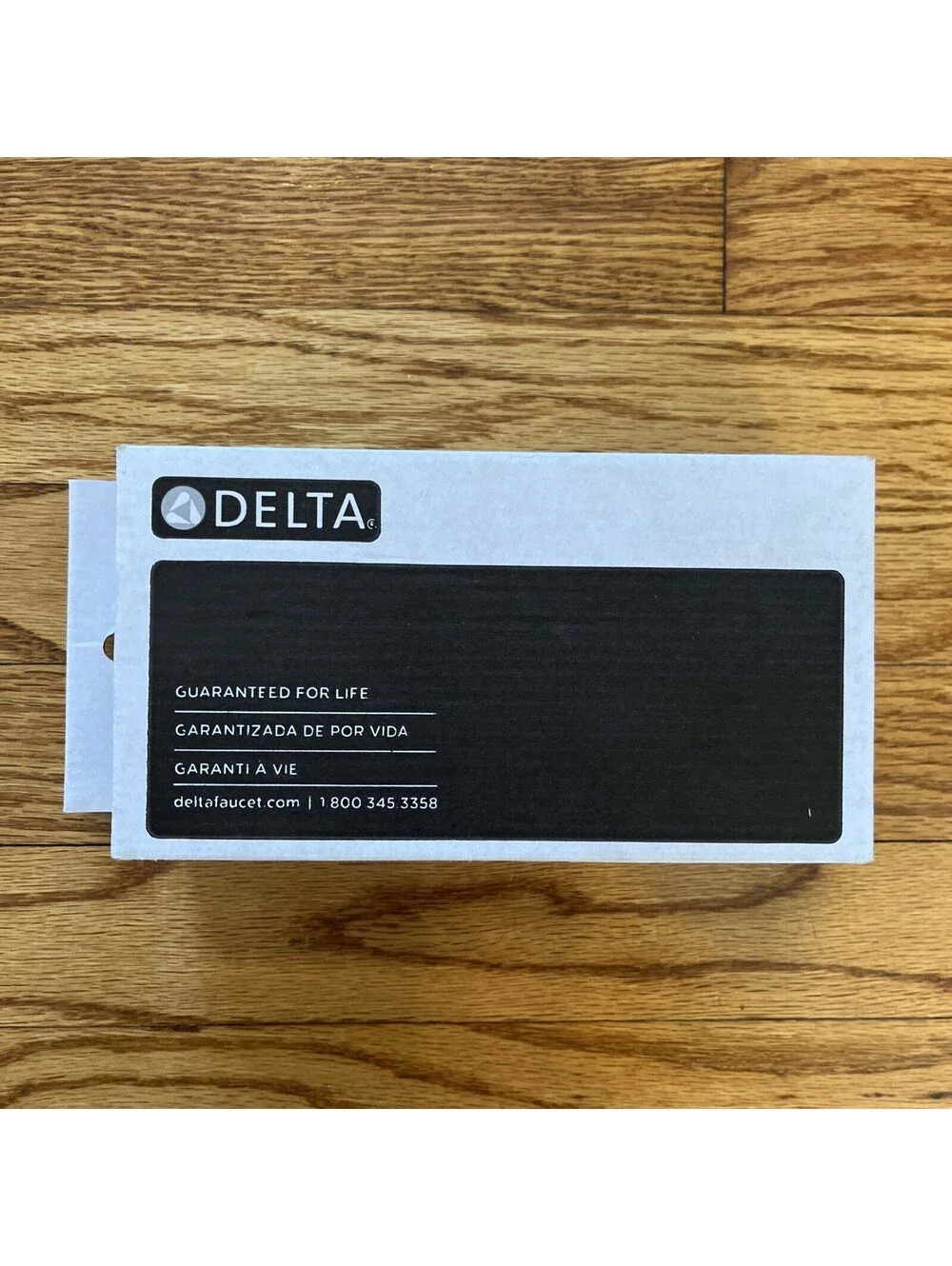 Delta 78955-CZ Tetra Wall Mounted Pivoting Toilet Paper Tissue Holder Bronze New